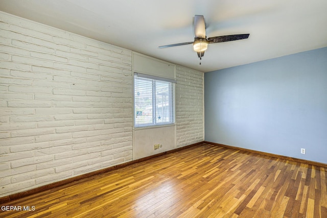 8024 Tonto Pl, El Paso, TX 79904 - empty room featuring wood-type flooring, baseboards, and ceiling fan