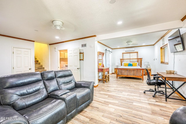 8024 Tonto Pl, El Paso, TX 79904 - living area featuring ceiling fan, crown molding, stairs, light wood-style floors, and recessed lighting
