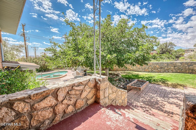 8024 Tonto Pl, El Paso, TX 79904 - view of patio / terrace with an in-ground hot tub