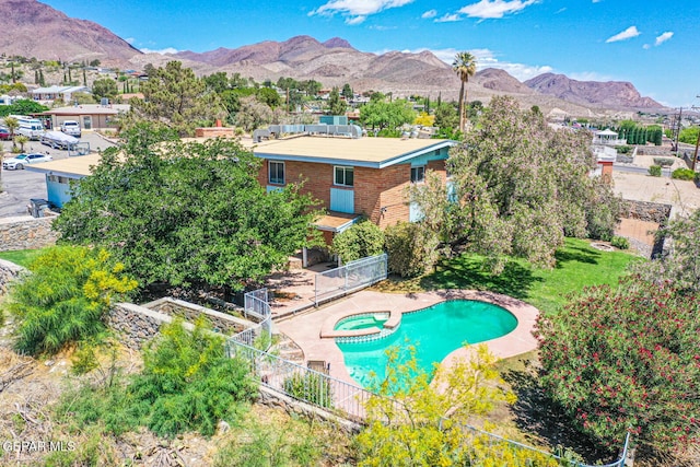 8024 Tonto Pl, El Paso, TX 79904 - view of pool with a mountain view and a pool with connected hot tub
