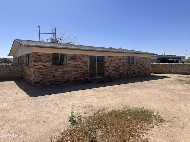 9603 Bahamas St, El Paso, TX 79927 - rear view of property featuring brick siding and fence