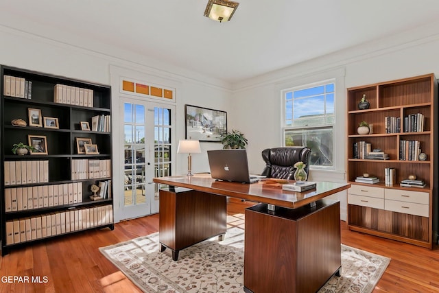 office area featuring plenty of natural light and light wood-style flooring