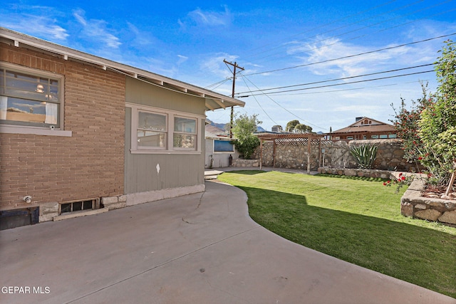 view of yard with a patio