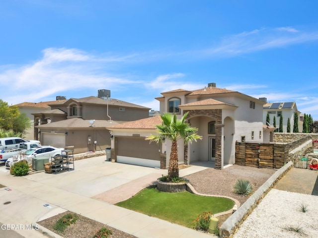 3096 Java Chip Pl, El Paso, TX 79938 - mediterranean / spanish home featuring stucco siding, a garage, and concrete driveway