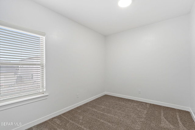 14740 Jack White Ave, El Paso, TX 79938 - unfurnished room with carpet floors and baseboards