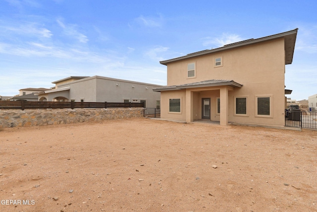 14740 Jack White Ave, El Paso, TX 79938 - back of house featuring a fenced backyard and stucco siding