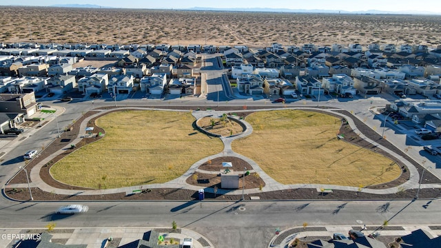 14740 Jack White Ave, El Paso, TX 79938 - aerial perspective of suburban area with a mountainous background