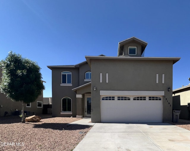 13192 Lost Willow, El Paso, TX 79938 - view of front of property featuring concrete driveway, stucco siding, and an attached garage