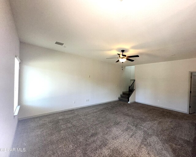 13192 Lost Willow, El Paso, TX 79938 - carpeted empty room with stairway, ceiling fan, and baseboards