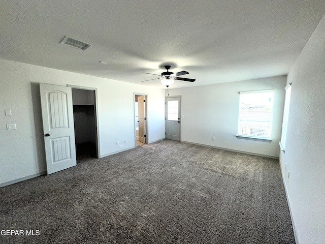 13192 Lost Willow, El Paso, TX 79938 - unfurnished bedroom with carpet floors, baseboards, and a ceiling fan