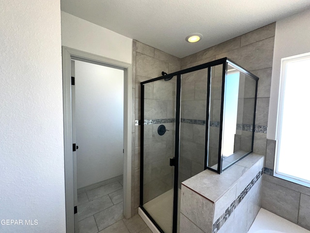 13192 Lost Willow, El Paso, TX 79938 - bathroom featuring a stall shower and tile patterned flooring