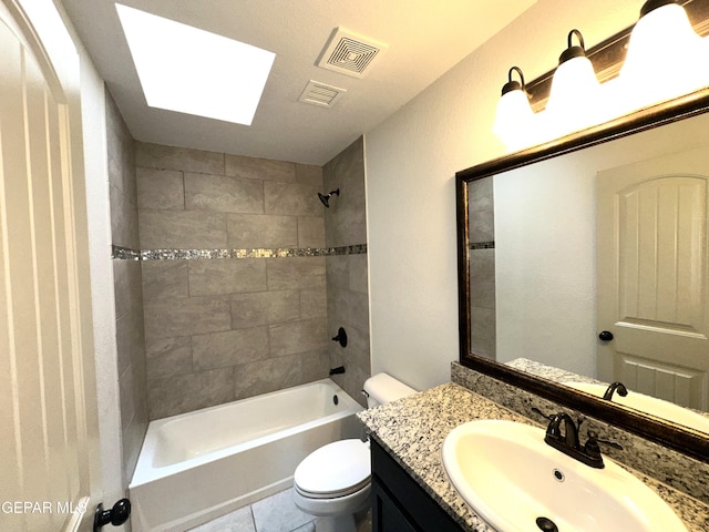 13192 Lost Willow, El Paso, TX 79938 - bathroom featuring toilet, washtub / shower combination, vanity, and a skylight