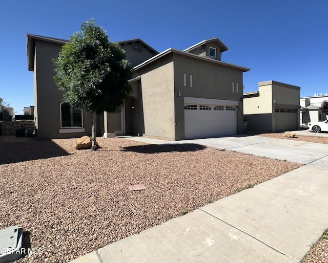 13192 Lost Willow, El Paso, TX 79938 - view of front of house featuring driveway and stucco siding