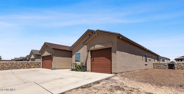 14840 Pebble Hills Blvd, El Paso, TX 79938 - view of side of property with stucco siding
