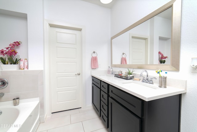 13673 Samlesbury Ave, Horizon City, TX 79928 - bathroom with tile patterned flooring, a garden tub, and double vanity
