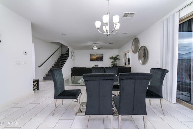 13673 Samlesbury Ave, Horizon City, TX 79928 - dining room featuring stairway, ceiling fan, a chandelier, and light tile patterned floors