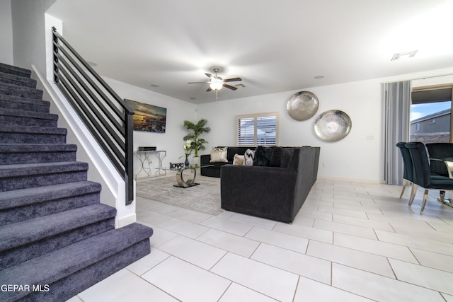 13673 Samlesbury Ave, Horizon City, TX 79928 - tiled living area with stairs and ceiling fan