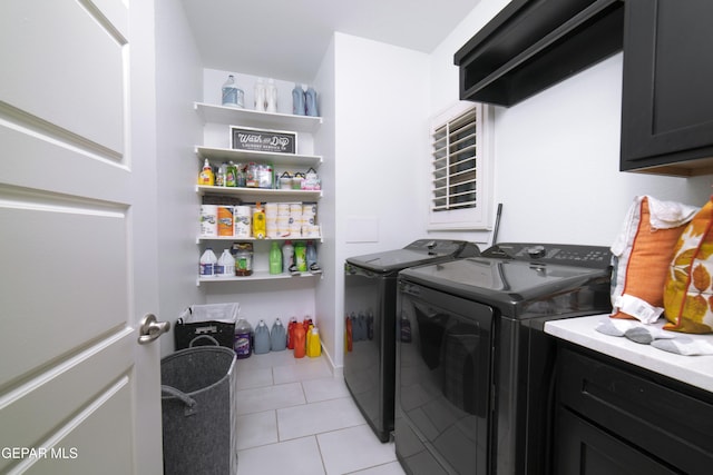13673 Samlesbury Ave, Horizon City, TX 79928 - laundry area with washing machine and clothes dryer, cabinet space, and light tile patterned flooring
