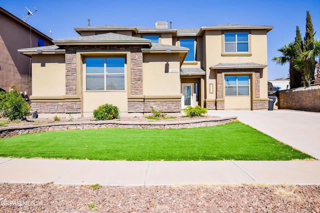 12093 Rathmore Dr, El Paso, TX 79928 - prairie-style house featuring stone siding, stucco siding, and a front yard