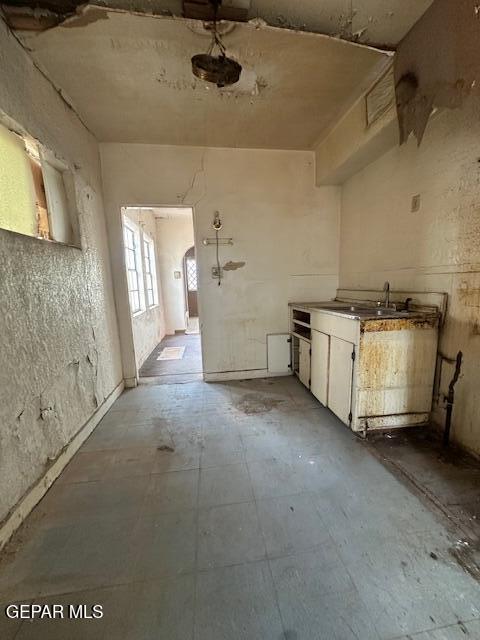 miscellaneous room featuring a sink