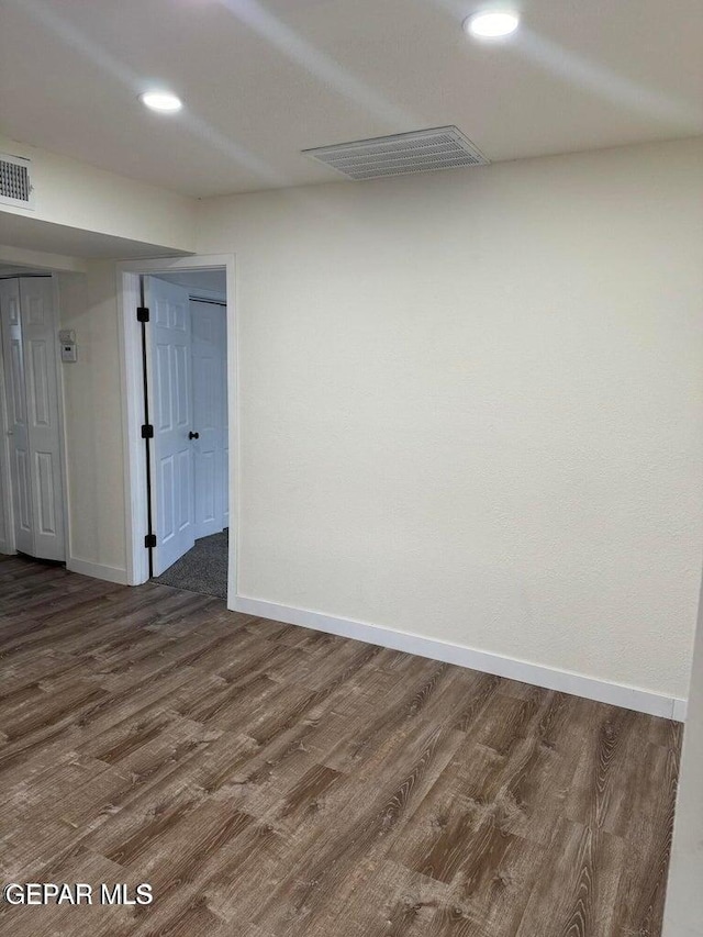 3512 Kemp Ave, El Paso, TX 79904 - empty room with wood finished floors and recessed lighting
