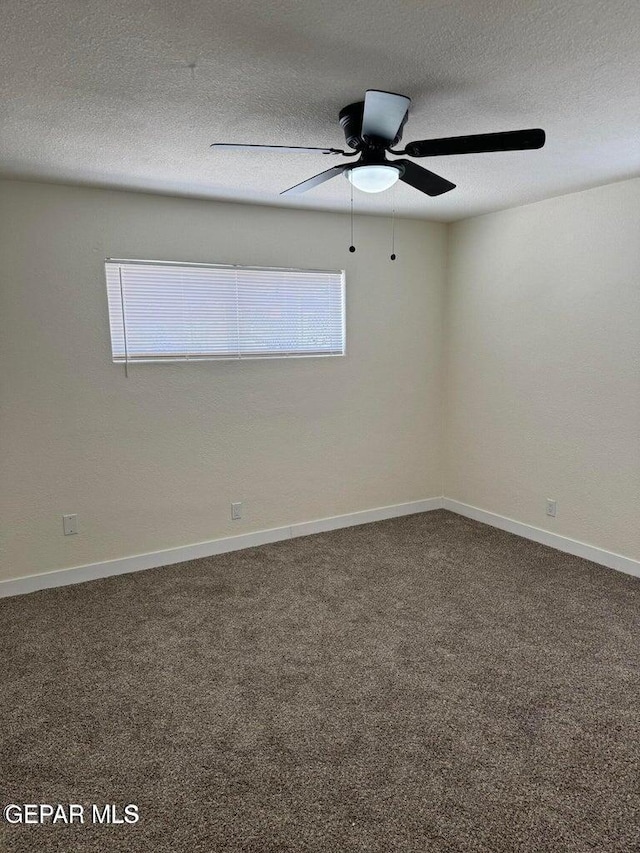 3512 Kemp Ave, El Paso, TX 79904 - unfurnished room featuring carpet flooring, ceiling fan, and a textured ceiling