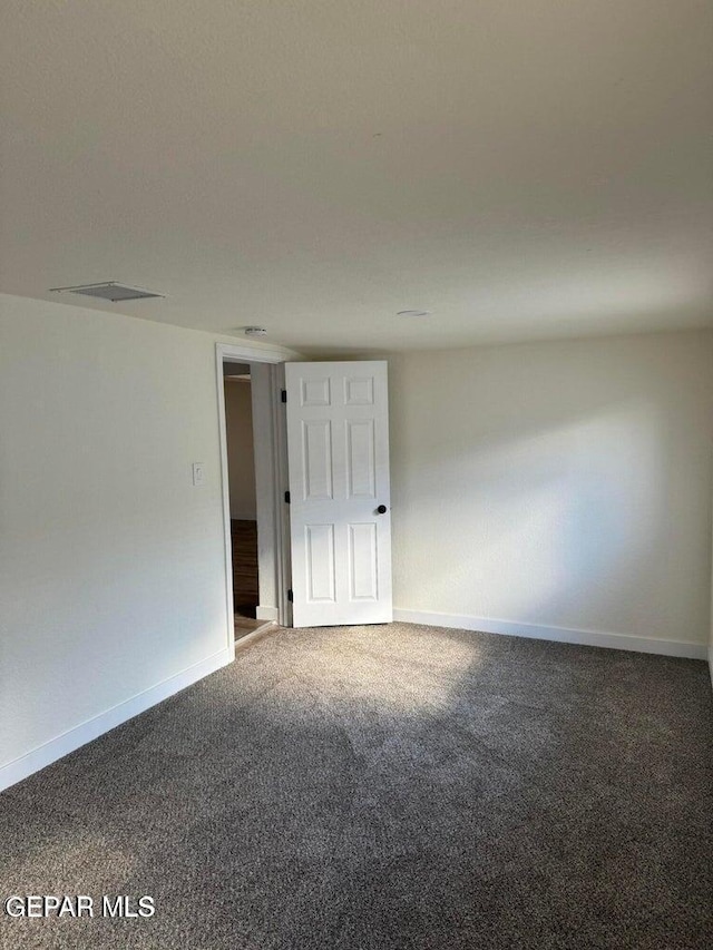 3512 Kemp Ave, El Paso, TX 79904 - carpeted spare room featuring baseboards