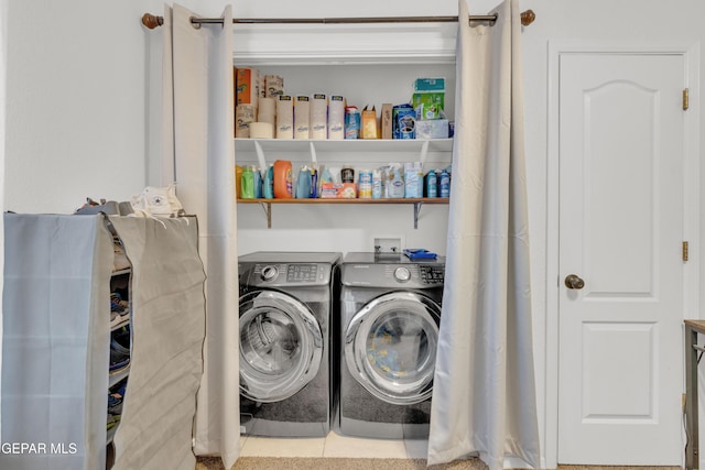 washroom featuring independent washer and dryer