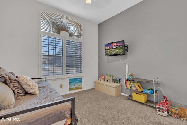 bedroom featuring carpet floors, baseboards, and ceiling fan