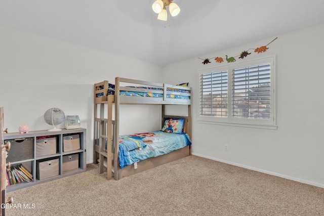 bedroom with carpet flooring, baseboards, and ceiling fan