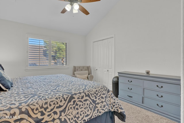 bedroom featuring a closet, carpet flooring, a ceiling fan, and high vaulted ceiling