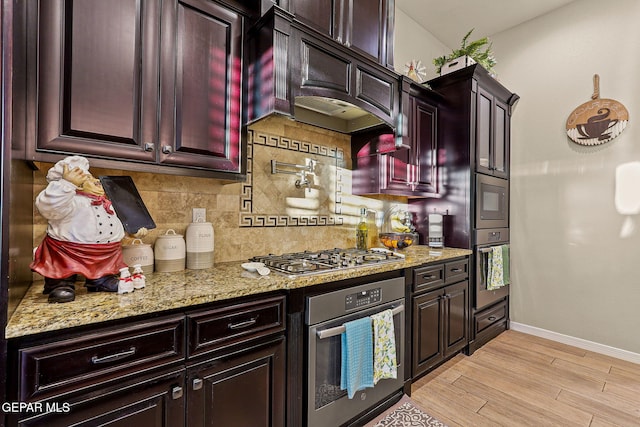12289 Fresh Water Dr, El Paso, TX 79928 - kitchen with stainless steel appliances, tasteful backsplash, baseboards, light wood-type flooring, and light stone counters