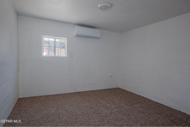 318 Austin St, Fabens, TX 79838 - spare room with a wall mounted AC and carpet floors