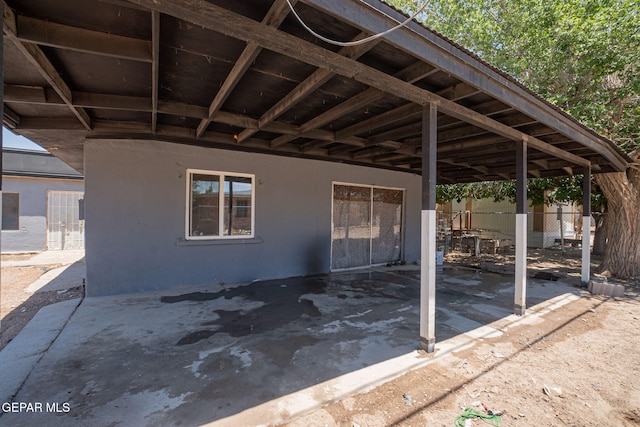 318 Austin St, Fabens, TX 79838 - view of patio with fence and a carport
