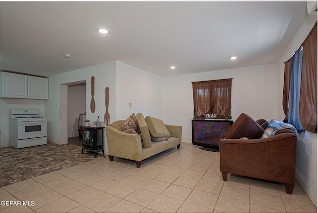 318 Austin St, Fabens, TX 79838 - living room featuring recessed lighting and light tile patterned flooring