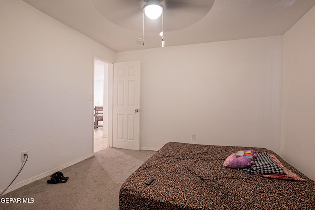 318 Austin St, Fabens, TX 79838 - bedroom featuring carpet floors, baseboards, and a ceiling fan