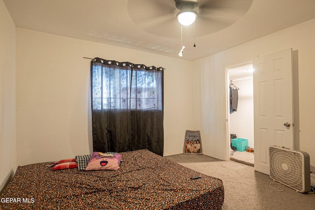 318 Austin St, Fabens, TX 79838 - carpeted bedroom with a ceiling fan and baseboards