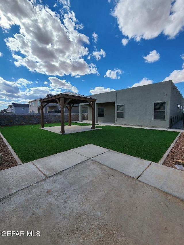 14508 Russell Borea, El Paso, TX 79938 - view of front of house with stucco siding, a gazebo, and a patio