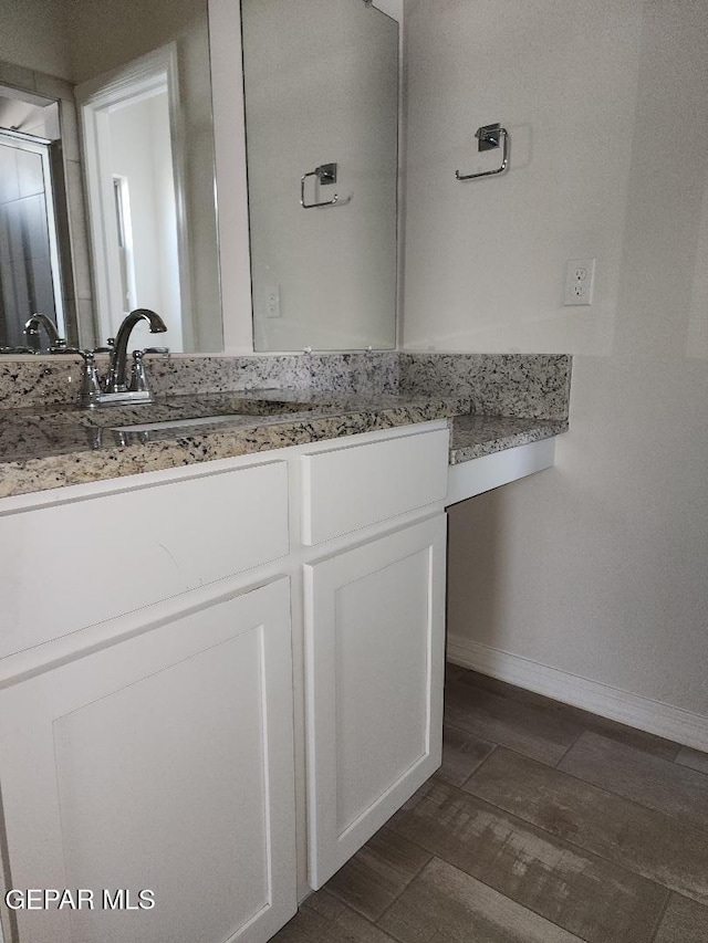 14508 Russell Borea, El Paso, TX 79938 - bathroom with baseboards and vanity