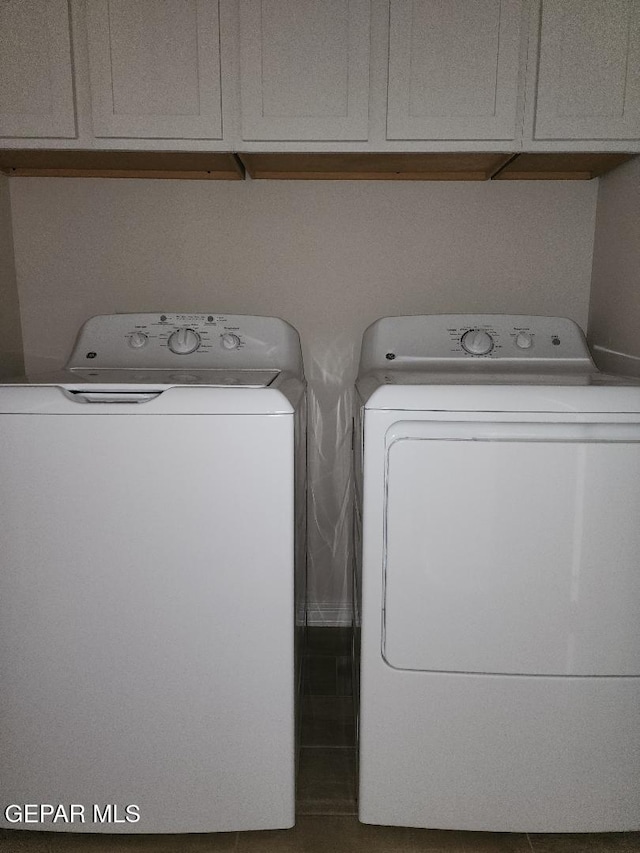 14508 Russell Borea, El Paso, TX 79938 - laundry area with washing machine and clothes dryer and cabinet space
