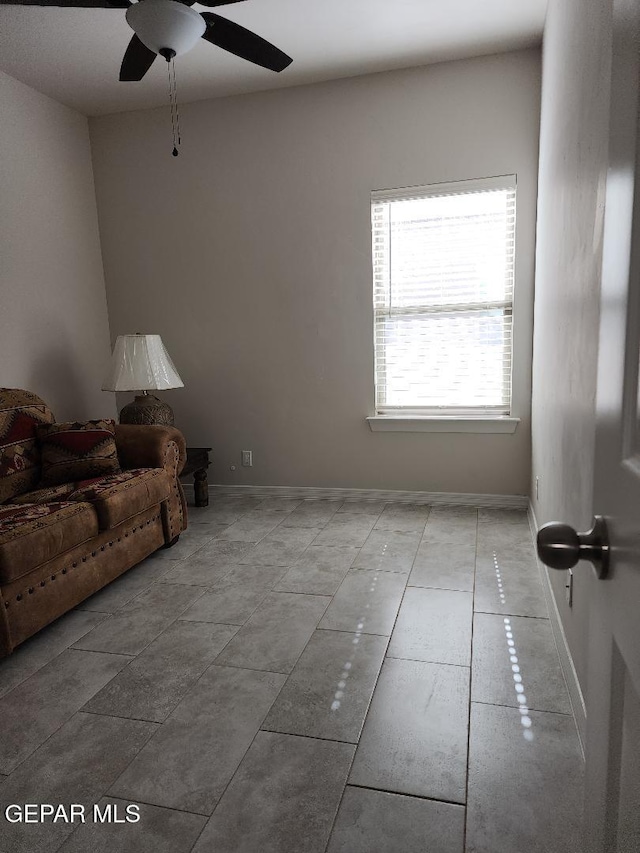 14508 Russell Borea, El Paso, TX 79938 - living room featuring a ceiling fan and baseboards