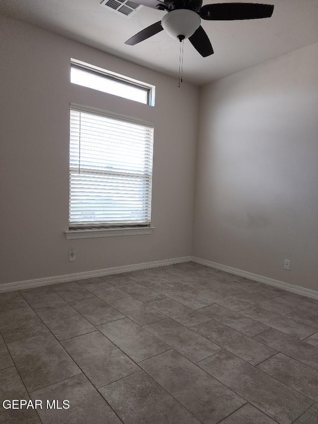14508 Russell Borea, El Paso, TX 79938 - spare room featuring ceiling fan, plenty of natural light, tile patterned flooring, and baseboards