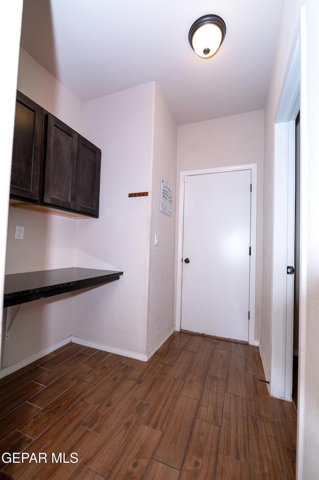 804 Spofforth Rd, El Paso, TX 79928 - corridor with dark wood-type flooring and baseboards