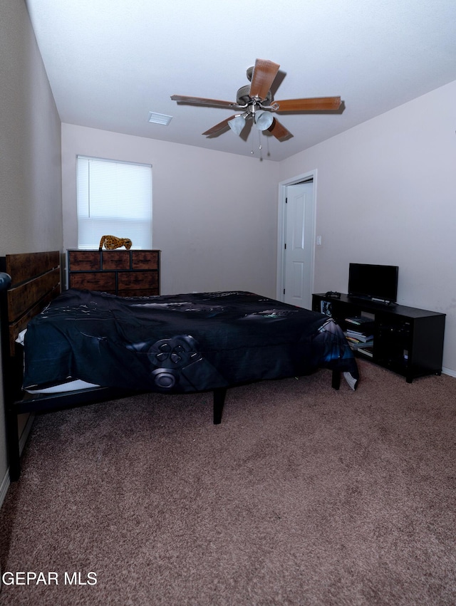 804 Spofforth Rd, El Paso, TX 79928 - carpeted bedroom with a ceiling fan and baseboards