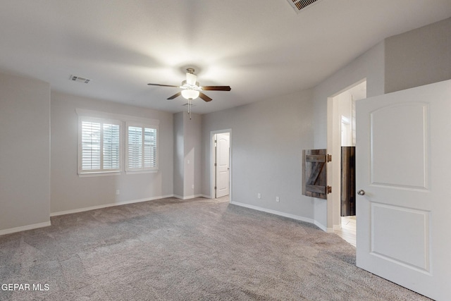 14813 Pebble Hills Blvd, El Paso, TX 79938 - spare room with a ceiling fan, light colored carpet, and baseboards