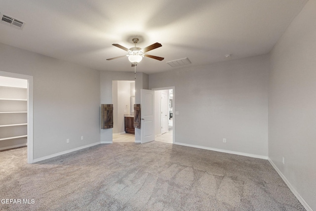 14813 Pebble Hills Blvd, El Paso, TX 79938 - unfurnished bedroom with a spacious closet, light carpet, and baseboards