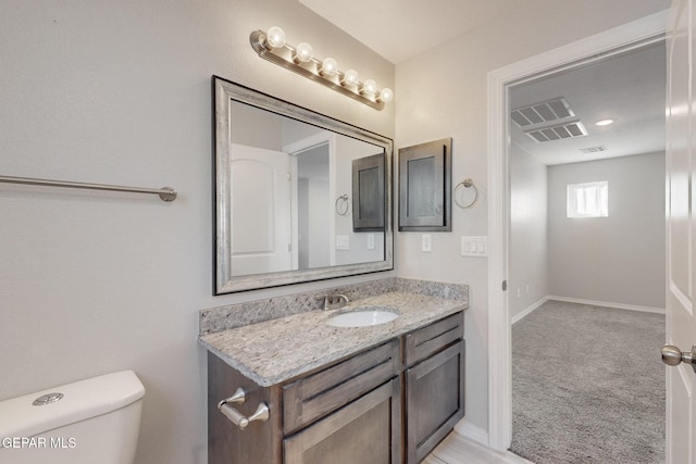 14813 Pebble Hills Blvd, El Paso, TX 79938 - half bath featuring toilet, vanity, and baseboards