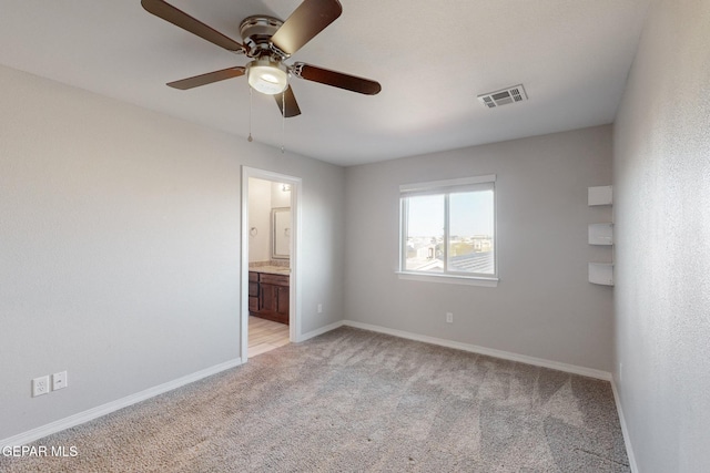 14813 Pebble Hills Blvd, El Paso, TX 79938 - spare room with light carpet, a ceiling fan, and baseboards