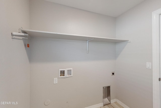 14813 Pebble Hills Blvd, El Paso, TX 79938 - laundry area featuring washer hookup, electric dryer hookup, baseboards, and gas dryer hookup