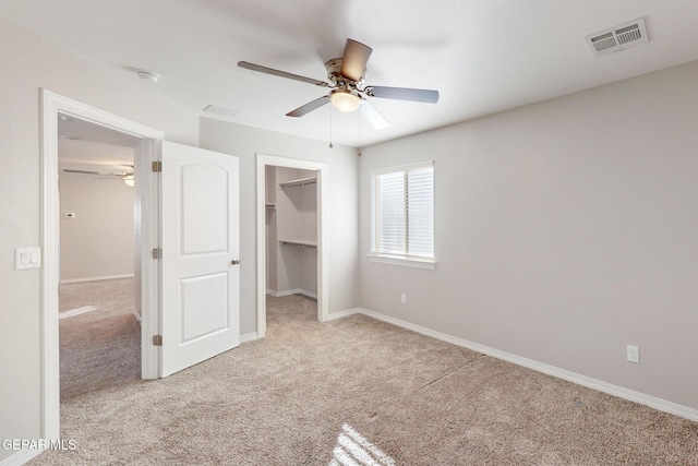 14813 Pebble Hills Blvd, El Paso, TX 79938 - unfurnished bedroom with carpet, a spacious closet, a closet, and baseboards